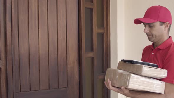 Deliveryman Knocking at Door and Giving Packages To Customert