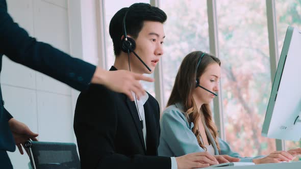 Business People Wearing Headset Working in Office