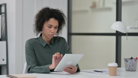 African Woman Using Tablet Work