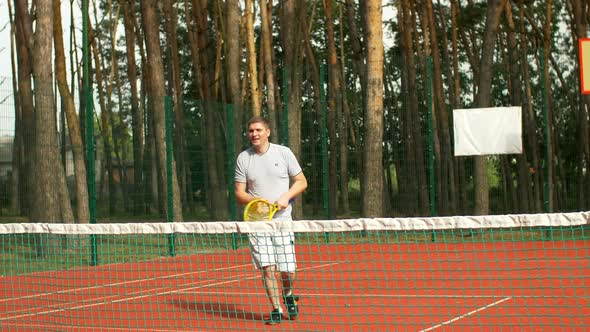 Tennis Player Scoring Match Point and Winning Game