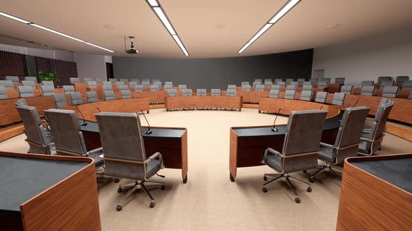 Interior Of An Empty Conference Hall With Gray Color Seats, Microphones On The Desks