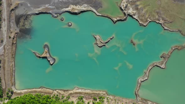 Drone View of the Turquoise Lake Formed As a Result of Mining Waste