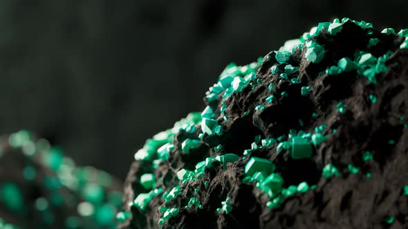 Green uranium ore gems in a mine. Glowing green radioactive ore in close up 4KHD