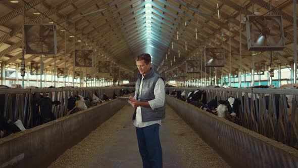 Farm Engineer Work Cowshed Holding Clipboard