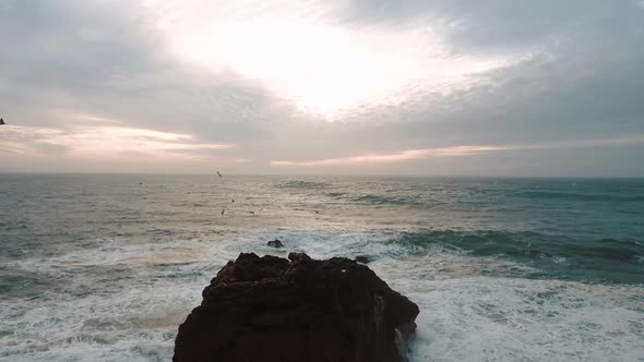 Sea Wave Breaks On Beach Rocks Landscape