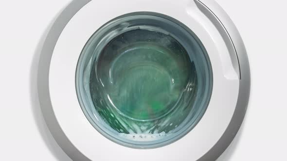 Timelapse White Domestic Washing Machine Laundry Machine Wash Colored Clothes Timelapse Shot