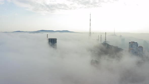 The Mystical Morning City of Vladivostok with Houses Shrouded in Fog