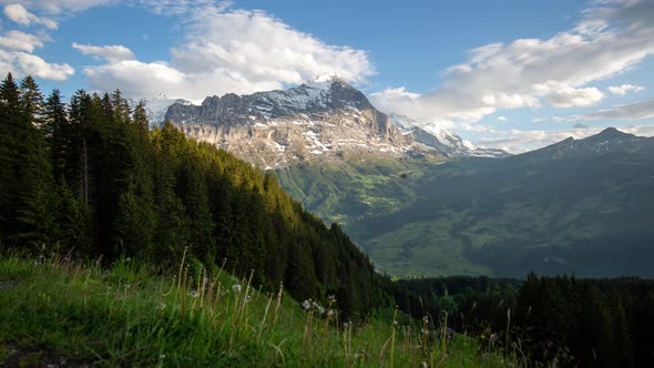 Timelapse of dynamic cumulus clouds moving over the Eiger in Switzerland