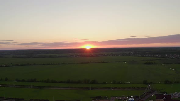 Sunset in fields. Drone Shots