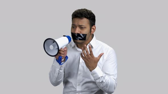 Young Censored Man with Loudspeaker