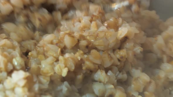 Mixing the Buckwheat Porridge with the Mash Food