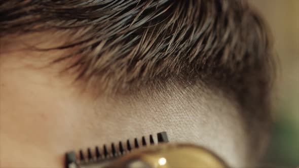 Men's Haircut and Hair Styling in a Barbershop, Beauty Salon. 