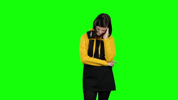 Teen Suffers From a Headache. Green Screen