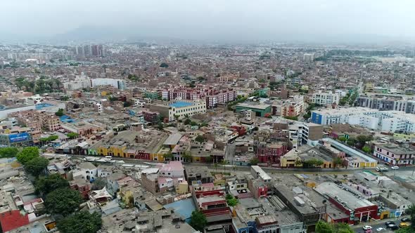 drone view over Lima Peru, high buildings and ocean on the background