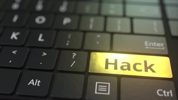 Black Computer Keyboard and Gold Hack Key
