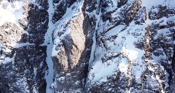 Huge Rocks Covered with Snow