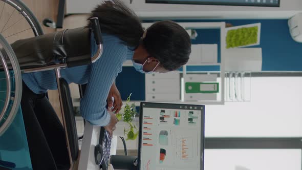 Video Vertical Paralysed Black Worker and Employee with Protective Mask Working Together