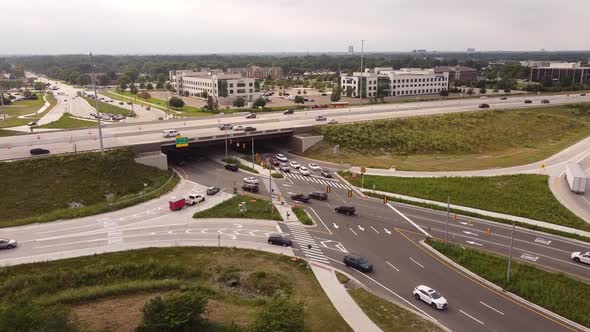 Aerial View Of Traffic Driving At First Diverging Diamond In Michigan, United States.