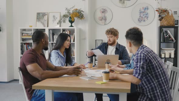 Friendly Creative Diverse Colleagues Team Discuss Startup Project