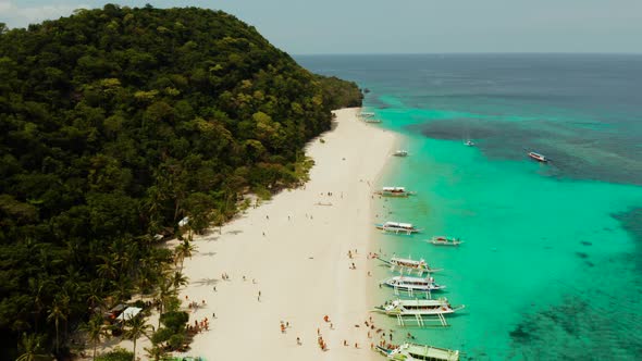 Tropical Beach and Turquoise Lagoon Water