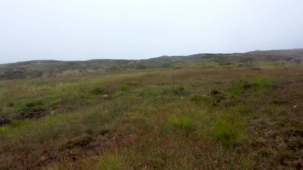 Flying Through Dense Fog at Glengad Mountain at Malin in County Donegal - Ireland