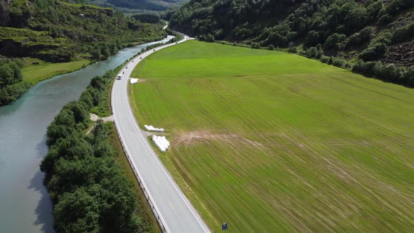 E39 Higway through stardalen valley between Byrkjelo and Klakegg in Sogn Norway - Aerial showing roa