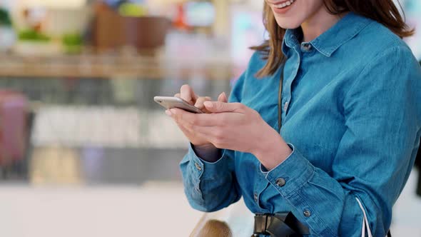 Woman choosing the next direction of shopping