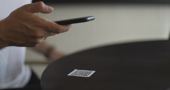 Closeup of Smartphone in Male Hands Tapping on Screen