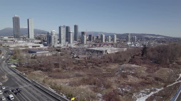 Burnaby city skyscrapers and industrial area, Lower Mainland region of British Columbia, Canada. Aer