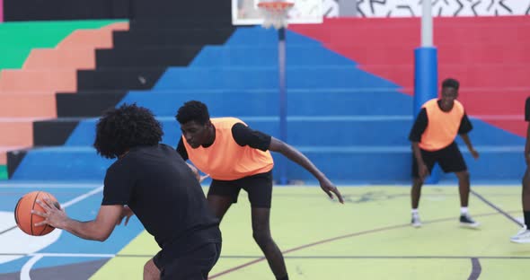 African friends playing basketball outdoor - Urban lifestyle concept