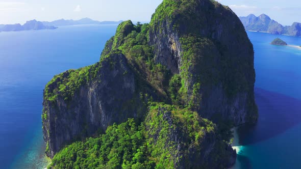 Amazing Nature Landscape High Rocky Pinagbuyutan Island and Azure Sea of El Nido, Palawan