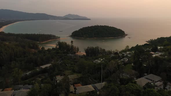 Drone Flight Over the Jungle and Sea After Sunset