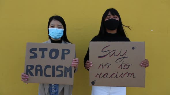 Two Asian Women Protesting Against Chinese Racism