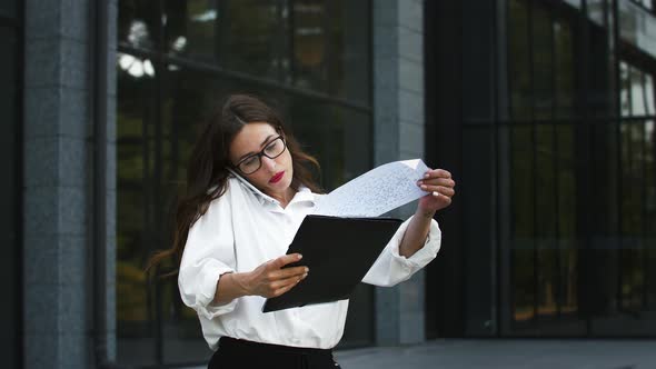 Woman in Glasses White Shirt and Black Pants