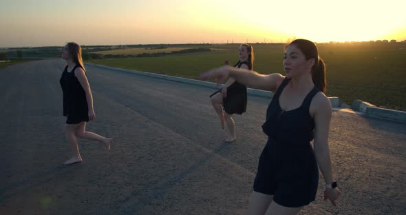 Three Beautiful Women Are Dancing Outdoors Professional Dancers Film Grain