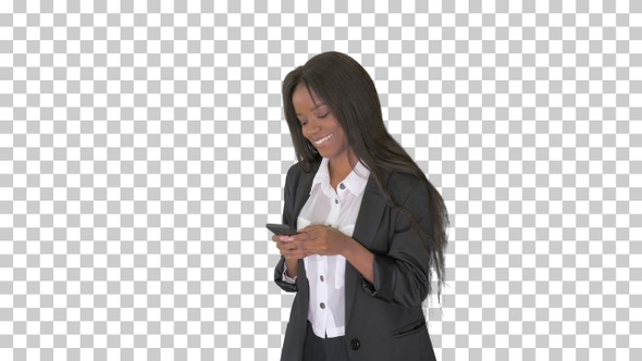 Beautiful black businesswoman texting, Alpha Channel