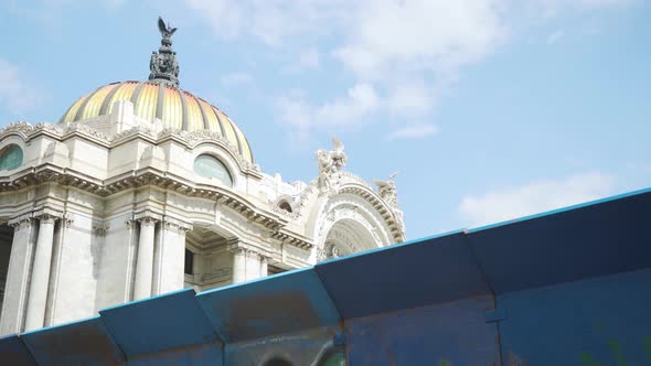 Police prepare for protests with large steel barriers to protect  buildings in Mexico City, Mexico.