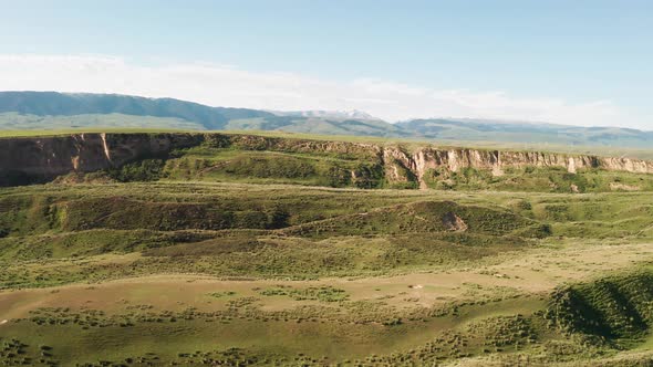 Mountain peaks and grassland