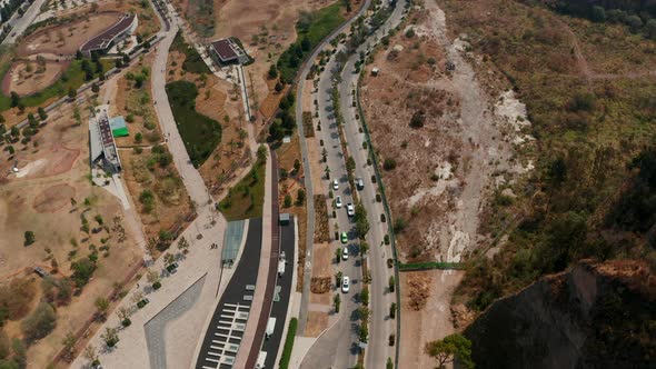 Aerial Drone View of Winding Road Leading Around Public Park La Mexicana in Santa Fe