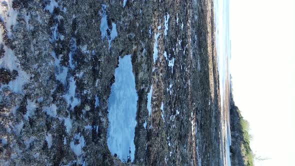 Vertical Video of Low Tide in the Ocean Near the Coast of Zanzibar Tanzania Aerial View