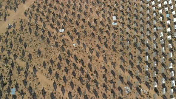 Aerial Tilt Up from Mirrors for Solar Electric Generators to Open Desert