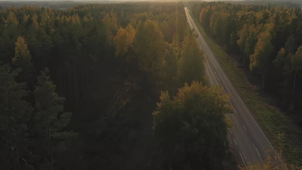 A Drone Shot of the Road to Sunset in Finland