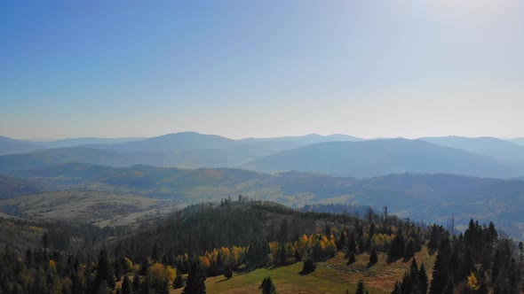 Flight over autumn mountains.