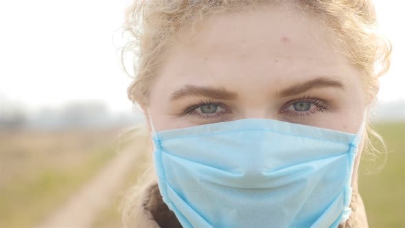 Closeup of a Girl in a Medical Mask