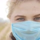 Closeup of a Girl in a Medical Mask - VideoHive Item for Sale