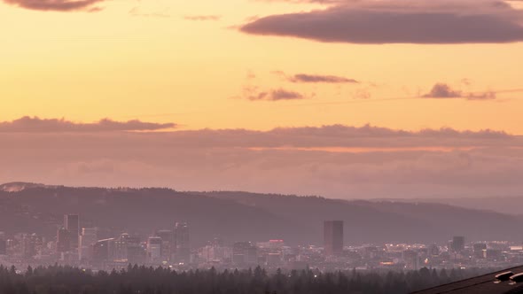 Timelapse of night coming over Portland Oregon and building lights turning on in the city center.