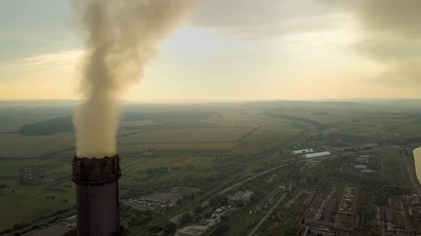 Aerial View of High Chimney Pipes with Grey Smoke From Coal Power Plant