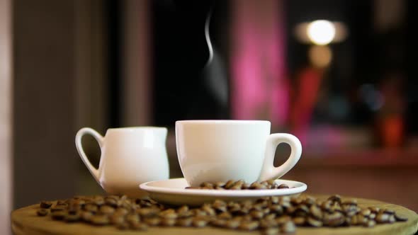 Coffee On A Turntable With Steam From A Cup