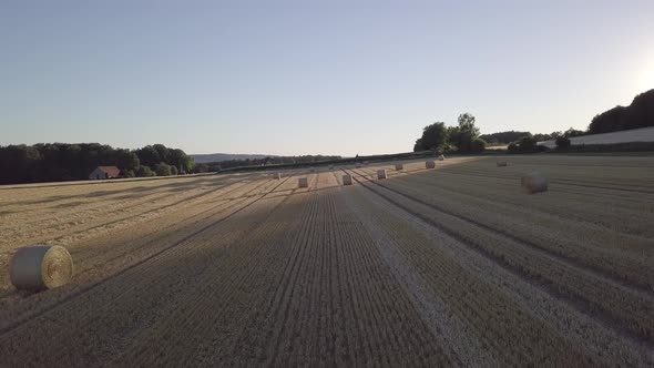 Drone Shot Of Golden Harvested field In Germany At Sunset
