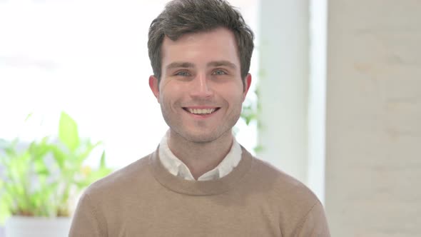 Portrait of Attractive Man Smiling at Camera